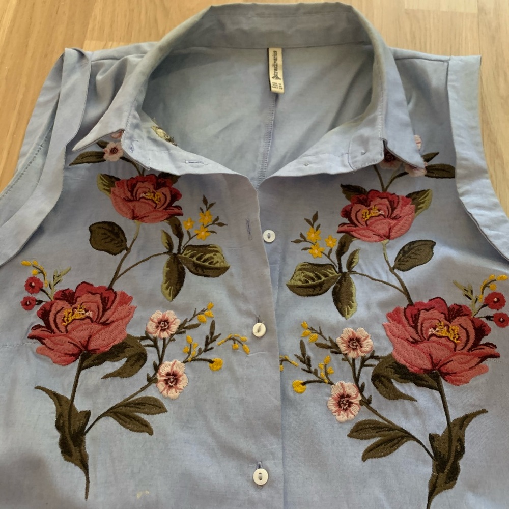 Embroidered button down.